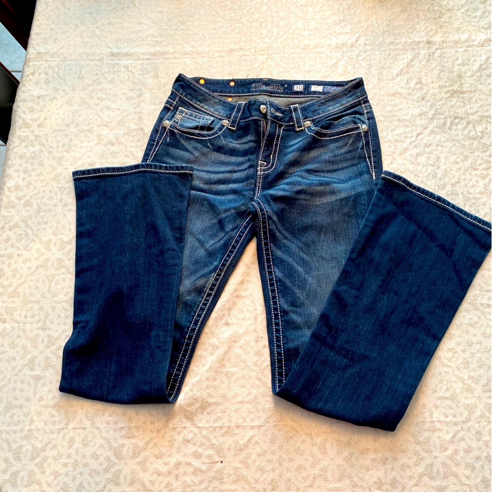 Miss Me jeans dark wash and flattering boot cut leg.